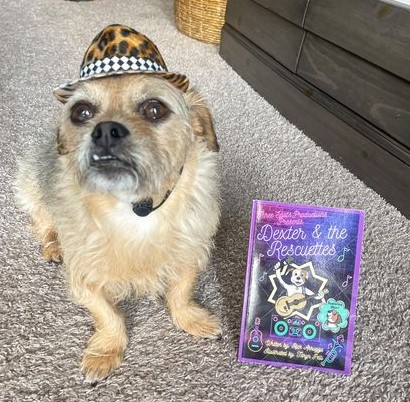 Hat-wearing bass player Freddie loves Dexter and the Rescuettes!